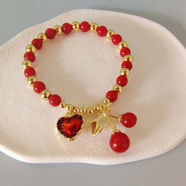 Pulsera Dorada Corazón y Perlas en Acero Inoxidable